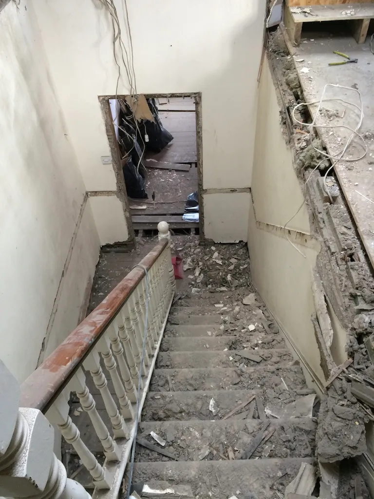 New structural opening formed off the stairwell to serve a separate flat entrance